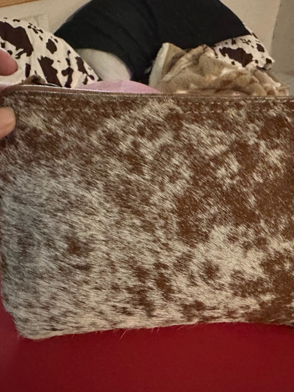Brown and White Cowhide Zip Clutch